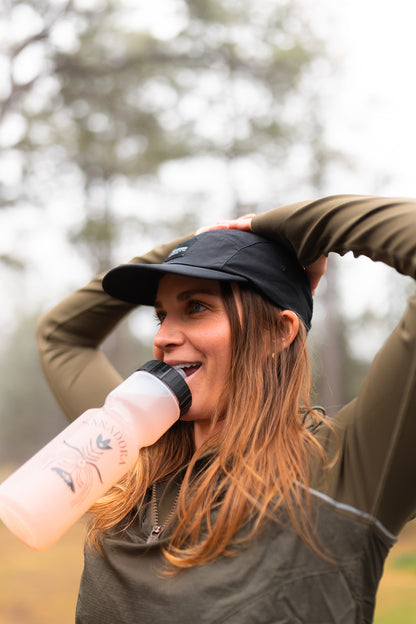 Woman outdoors drinking Creatine Cactus Water